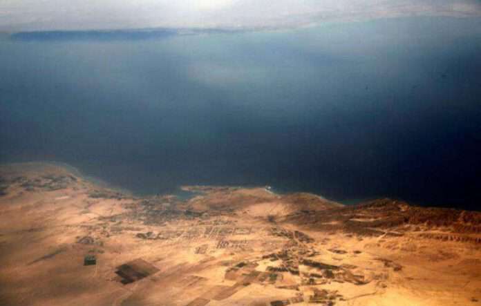 An aerial view of the coast of the Red Sea and the two islands of Tiran and Sanafir is pictured through the window of an airplane near Sharm el-Sheikh